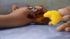 bim bim vị càng cua chua cay